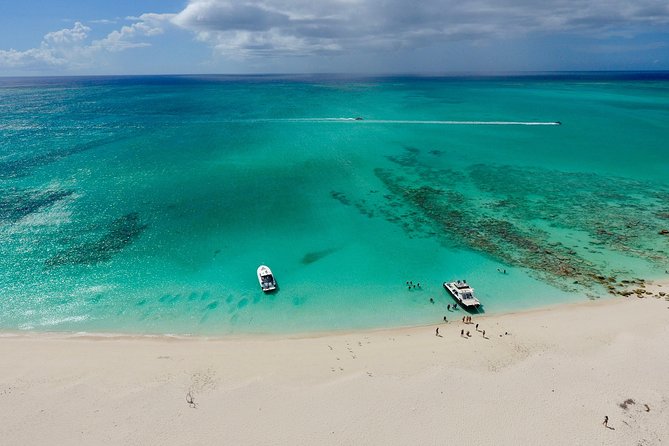 Boats moored off the white sand of Grace Bay, Providenciales