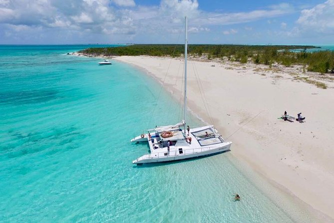 7 Hour Private Catamaran Sail, Snorkel and Beach BBQ Grace Bay, Providenciales - A charcoal-grilled lunch on an uninhabited beach