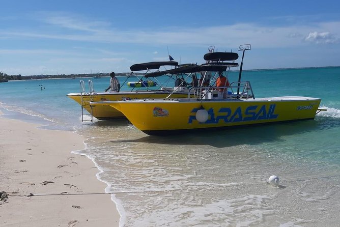 Capt Marvin Watersports / Parasail - Public Tour - Starting from the sand at Grace Bay