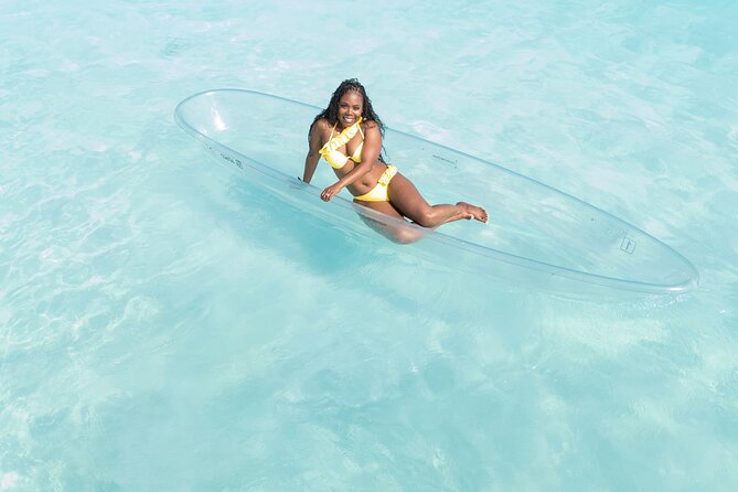 Exclusive Aerial Reflection: Solo Clear Kayak in Turks and Caicos - Poses, props, and making the short window count