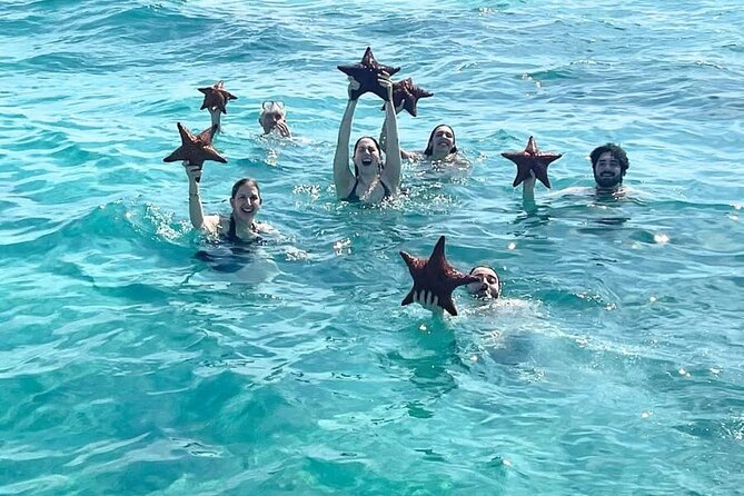 Group Catamaran 4 hr tour coral reef fun Iguana island adventure! - Starting at Turtle Cove Marina in Providenciales