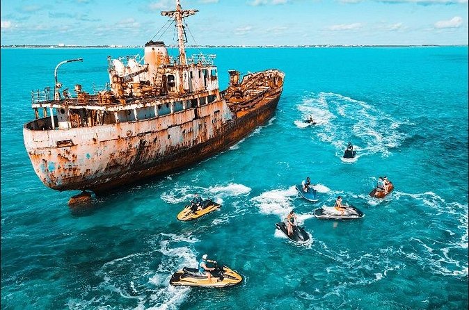 Jet Skiing around La famille ship and smaller pristine cays - Cays, beaches, and the changing route