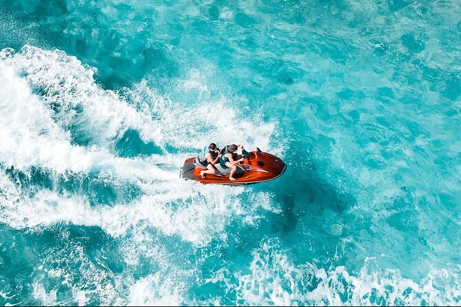 Jet Skiing around La famille ship and smaller pristine cays - La Famille Express, the ghost ship