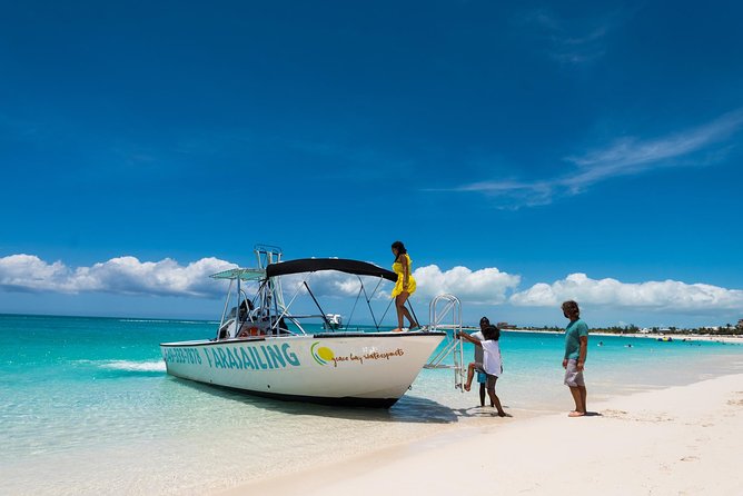 Parasailing Adventure from Providenciales in Turks and Caicos - From the beach to the parasailing boat