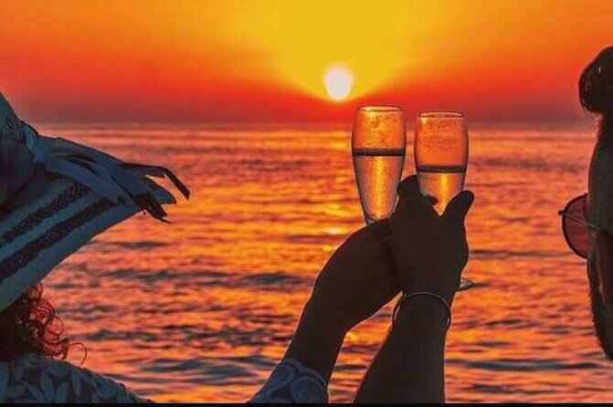 Private 2Hour Champagne Scenic Sunset cruise - Leeward Point and Emerald Point Reef views