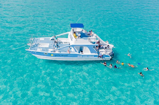 Private 4-Hour Catamaran Tour from Providenciales in Turks and Caicos - Grace Bay Beach begins the sightseeing