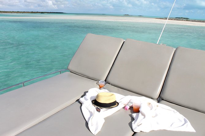 Private 4 Hour Power Catamaran Excursion in Grace Bay - Snorkeling, swimming, tubing, and the boat’s slide