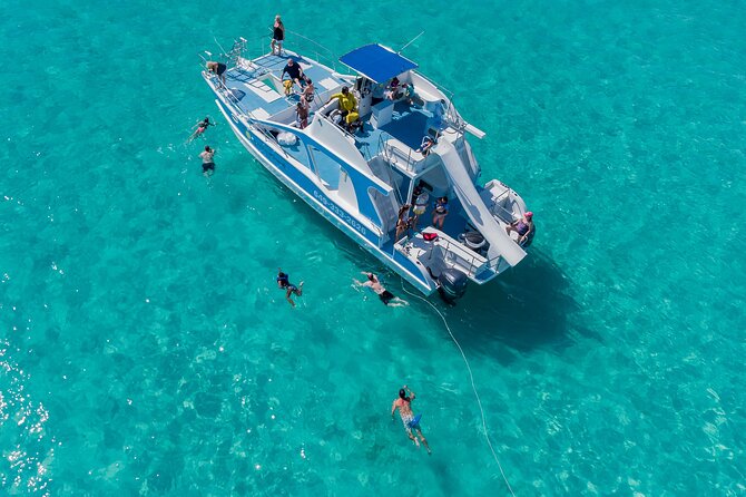 Private 7-Hour Catamaran Tour in Turks and Caicos - The Catamaran, Sundeck, and Second-Deck Slide