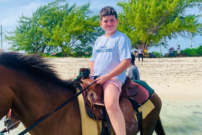 Shared Horseback Riding in Turks and Caicos - Riding along the sandy shore