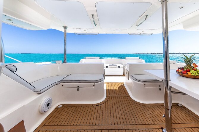 Turks and Caicos Full-Day Luxury Private Yacht Charter - Grace Bay views and the first reef stop